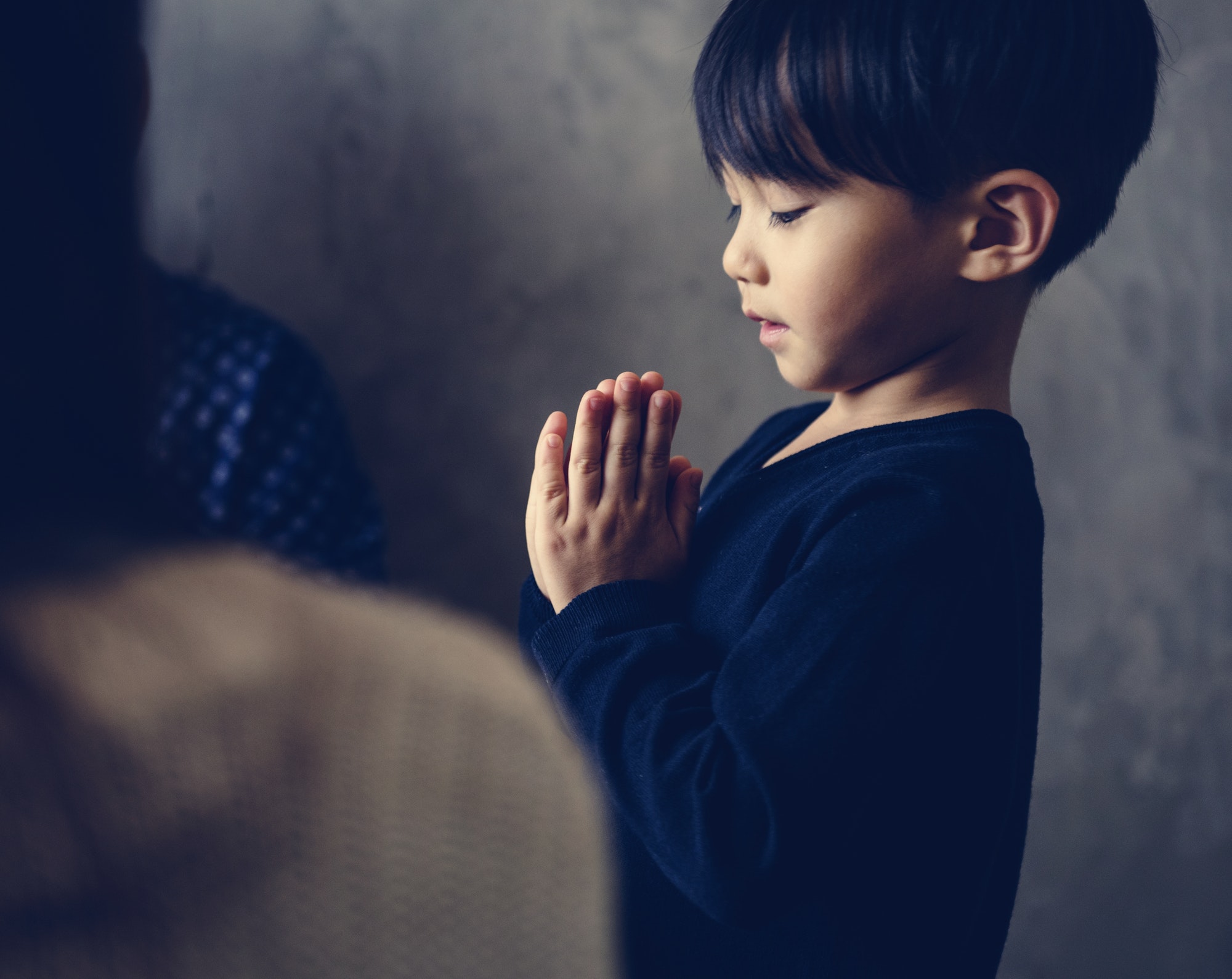 Japanese boy praying